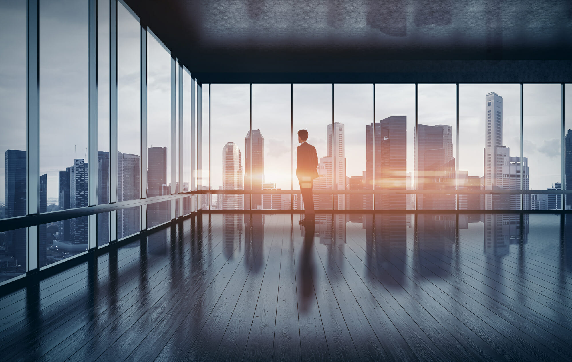 Business man in suit looking at the city